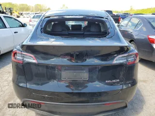 2023 Tesla Model Y Performance z VIN 7SAYGDEFXPF948763, wystawiony jako Copart lot #50562134 z przebiegiem 948 mil mil oraz Szkoda całkowita • Salvage title. Historia ofert i sprzedaży dostępna na DreamBid. Obrazek 6.