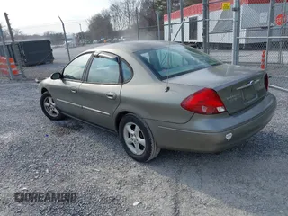 2002 Ford Taurus SE Standard with VIN 1FAFP53U72A145136, listed as a IAAI auction lot 41768868 with 209,765 mi miles and . Bid and sale history available at DreamBid. Image 3.