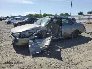 2001 Toyota Camry CE z VIN JT2BG22K410568101, wystawiony jako Copart lot #57184125 z przebiegiem Nie podano mil oraz Szkoda całkowita • Salvage title. Historia ofert i sprzedaży dostępna na DreamBid. Obrazek 1.