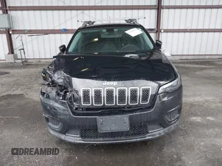 2020 Jeep Cherokee Latitude z VIN 1C4PJLCB1LD535765, wystawiony jako IAAI lot #41580618 z przebiegiem 56 040 mil mil oraz . Historia ofert i sprzedaży dostępna na DreamBid. Obrazek 12.