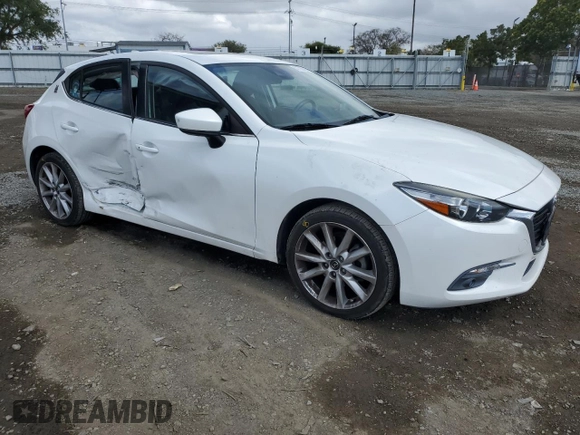 2017 Mazda 3 Grand Touring with VIN JM1BN1M37H1116869, listed as a Copart auction lot 51706765 with 86,334 mi miles and Salvage Title. Bid and sale history available at DreamBid. Image 4.
