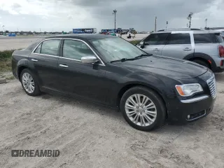 2013 Chrysler 300 Luxury Series with VIN 2C3CCASG7DH534199, listed as a Copart auction lot 75991324 with Not Provided miles and Salvage Title. Bid and sale history available at DreamBid. Image 4.