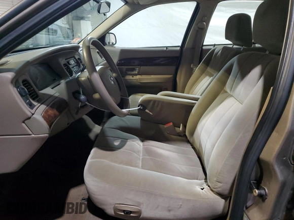 2005 Mercury Grand Marquis GS with VIN 2MEFM74WX5X614325, listed as a Copart auction lot 88117535 with 128,975 mi miles and Clean Title. Bid and sale history available at DreamBid. Image 7.