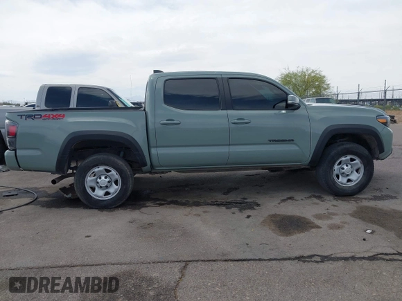 2022 Toyota Tacoma SR with VIN 3TMCZ5AN0NM507320, listed as a IAAI auction lot 42220296 with 33,342 mi miles and . Bid and sale history available at DreamBid. Image 13.