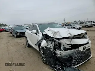 2023 Lexus RX with VIN 2T2BAMBAXPC002806, listed as a Copart auction lot 42963575 with 27,315 mi miles and Salvage Title. Bid and sale history available at carsss.com. Image 12.