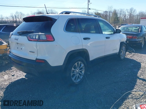 2021 Jeep Cherokee Altitude with VIN 1C4PJLLBXMD164087, listed as a IAAI auction lot 41694113 with 76,352 mi miles. Bid and sale history available at carsss.com. Image 4.