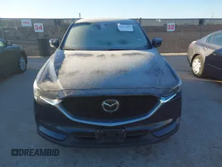 2019 Mazda CX-5 Signature with VIN JM3KFBEY5K0656965, listed as a IAAI auction lot 41421453 with 99,073 mi miles. Bid and sale history available at carsss.com. Image 12.