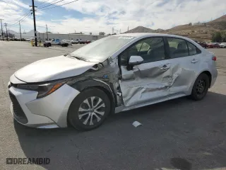 2020 Toyota Corolla Hybrid LE with VIN JTDEBRBE7LJ029233, listed as a Copart auction lot 43476165 with 118,385 mi miles and Salvage Title. Bid and sale history available at carsss.com. Image 1.