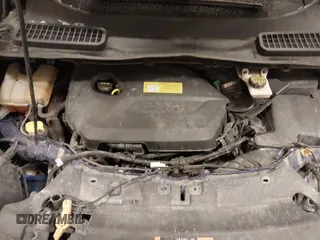 2014 Ford Escape SE z VIN 1FMCU9GX1EUD19721, wystawiony jako IAAI lot #41365586 z przebiegiem 146 219 mil mil oraz . Historia ofert i sprzedaży dostępna na DreamBid. Obrazek 10.