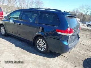 2011 Toyota Sienna XLE AAS with VIN 5TDYK3DCXBS114882, listed as a IAAI auction lot 42007417 with 144,087 mi miles and . Bid and sale history available at DreamBid. Image 3.