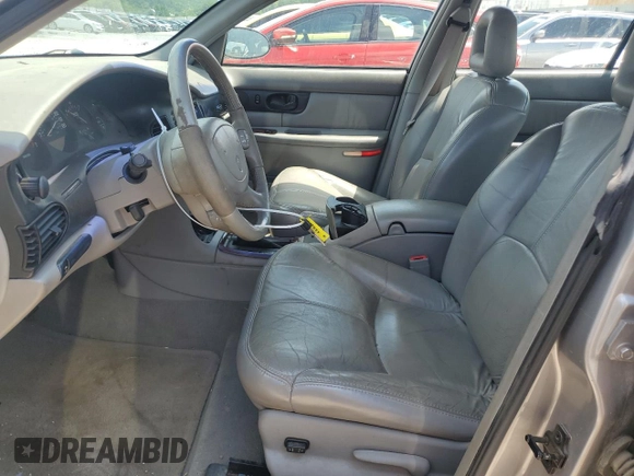 1998 Buick Regal LS with VIN 2G4WB52K7W1543743, listed as a Copart auction lot 60970515 with 142,559 mi miles and Salvage title. Bid and sale history available at DreamBid. Image 7.