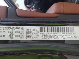 2015 Jeep Grand Cherokee Summit z VIN 1C4RJFJT0FC674494, wystawiony jako IAAI lot #42056835 z przebiegiem 143 969 mil mil oraz . Historia ofert i sprzedaży dostępna na DreamBid. Obrazek 9.