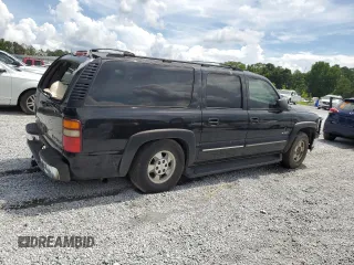 2000 Chevrolet Suburban LS with VIN 3GNFK16T5YG190971, listed as a Copart auction lot 60264695 with Not provided miles and Salvage title. Bid and sale history available at DreamBid. Image 3.