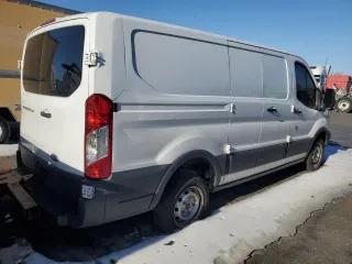 2016 Ford Transit Cargo with VIN 1FTYE1ZM5GKA06617, listed as a Copart auction lot 82596924 with 150,742 mi miles and Salvage Title. Bid and sale history available at carsss.com. Image 3.