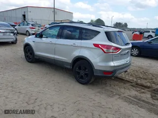 2014 Ford Escape SE with VIN 1FMCU9GX9EUA57799, listed as a IAAI auction lot 41967422 with 133,377 mi miles. Bid and sale history available at carsss.com. Image 3.