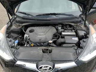 2014 Hyundai Veloster z VIN KMHTC6AD0EU188863, wystawiony jako Copart lot #54750925 z przebiegiem 96 212 mil mil oraz Szkoda całkowita • Salvage title. Historia ofert i sprzedaży dostępna na DreamBid. Obrazek 11.