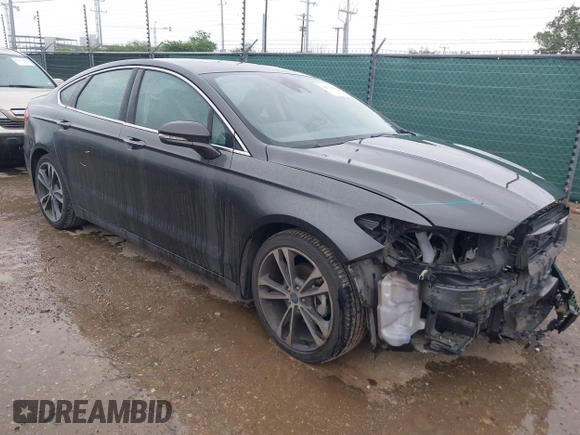2020 Ford Fusion Titanium with VIN 3FA6P0K97LR192657, listed as a IAAI auction lot 42170258 with 87,696 mi miles and . Bid and sale history available at DreamBid. Image 1.