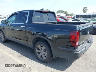 2020 Honda Ridgeline RTL-E with VIN 5FPYK3F70LB009376, listed as a IAAI auction lot 42488529 with 30,932 mi miles and . Bid and sale history available at DreamBid. Image 3.