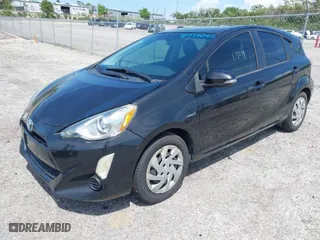 2015 Toyota Prius c One with VIN JTDKDTB3XF1108991, listed as a IAAI auction lot 41934043 with 180,552 mi miles. Bid and sale history available at carsss.com. Image 2.