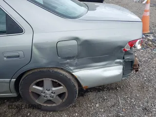 2001 Toyota Camry CE z VIN JT2BG22K410587070, wystawiony jako IAAI lot #42388043 z przebiegiem 119 183 mil mil oraz . Historia ofert i sprzedaży dostępna na DreamBid. Obrazek 6.