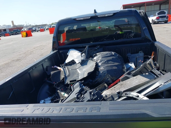 2022 Toyota Tundra SR with VIN 5TFKB5AB4NX016619, listed as a IAAI auction lot 40500811 with Not provided miles and . Bid and sale history available at DreamBid. Image 13.