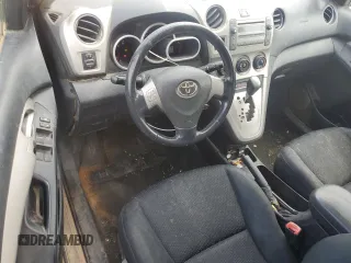 2009 Toyota Matrix S z VIN 2T1KE40E59C013407, wystawiony jako Copart lot #56980755 z przebiegiem 174 973 mil mil oraz Szkoda całkowita • Salvage title. Historia ofert i sprzedaży dostępna na DreamBid. Obrazek 8.