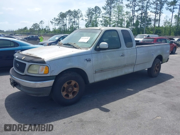 2002 Ford F-150 XL z VIN 1FTRX17W22NA55784, wystawiony jako IAAI lot #41958686 z przebiegiem 278 064 mil mil oraz . Historia ofert i sprzedaży dostępna na DreamBid. Obrazek 2.