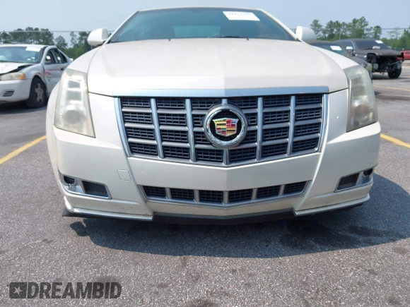 2012 Cadillac CTS Premium z VIN 1G6DP1E3XC0108543, wystawiony jako IAAI lot #42413547 z przebiegiem 80 570 mil mil oraz . Historia ofert i sprzedaży dostępna na DreamBid. Obrazek 6.