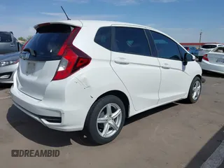 2019 Honda Fit LX with VIN 3HGGK5H49KM733792, listed as a IAAI auction lot 42597164 with 88,161 mi miles and . Bid and sale history available at DreamBid. Image 4.