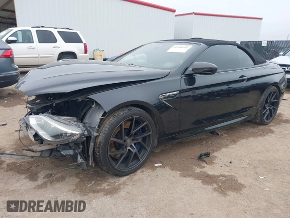 2014 BMW M6 z VIN WBSLZ9C58ED651156, wystawiony jako IAAI lot #41526192 z przebiegiem 90 642 mil mil oraz . Historia ofert i sprzedaży dostępna na DreamBid. Obrazek 17.
