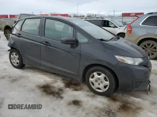 2015 Honda Fit LX with VIN 3HGGK5H50FM106879, listed as a Copart auction lot 46728995 with 95,994 mi miles and Salvage title. Bid and sale history available at DreamBid. Image 4.