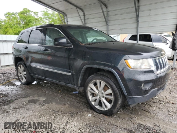 2012 Jeep Grand Cherokee Laredo with VIN 1C4RJEAG1CC316703, listed as a Copart auction lot 52128105 with 203,896 mi miles and Salvage Title. Bid and sale history available at carsss.com. Image 4.