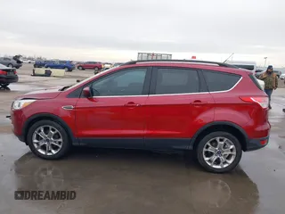 2015 Ford Escape SE with VIN 1FMCU0GXXFUC74470, listed as a IAAI auction lot 41419669 with 94,107 mi miles. Bid and sale history available at carsss.com. Image 14.