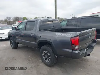 2018 Toyota Tacoma SR with VIN 5TFCZ5AN6JX127774, listed as a IAAI auction lot 41801158 with 28,161 mi miles and . Bid and sale history available at DreamBid. Image 3.