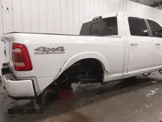 2019 Ram 2500 Laramie z VIN 3C6UR5FL7KG657180, wystawiony jako IAAI lot #41714476 z przebiegiem 97 334 mil mil oraz . Historia ofert i sprzedaży dostępna na DreamBid. Obrazek 6.