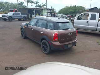2014 MINI Countryman with VIN WMWZB3C51EWR36737, listed as a IAAI auction lot 41741248 with 69,717 mi miles and . Bid and sale history available at DreamBid. Image 3.