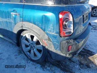 2018 MINI Countryman Cooper S with VIN WMZYT5C3XJ3E61612, listed as a IAAI auction lot 41276107 with 59,554 mi miles and . Bid and sale history available at DreamBid. Image 6.