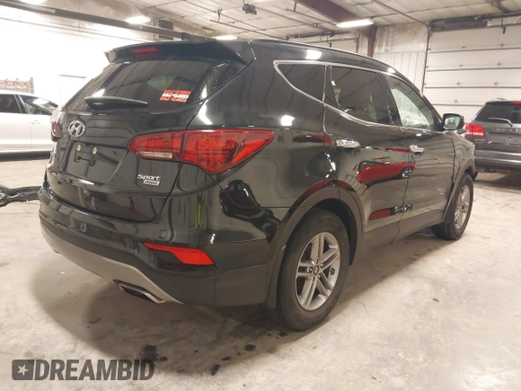 2017 Hyundai Santa Fe 2.4L with VIN 5NMZUDLBXHH041621, listed as a IAAI auction lot 42194586 with 91,012 mi miles and . Bid and sale history available at DreamBid. Image 4.