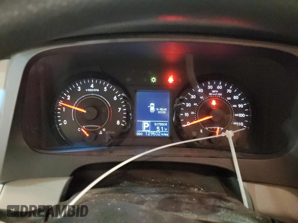 2016 Toyota Sienna LE with VIN 5TDJK3DC1GS130722, listed as a Copart auction lot 80244024 with 129,602 mi miles and Salvage Title. Bid and sale history available at carsss.com. Image 9.