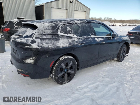 2025 BMW iX xDrive50 with VIN WB523CF04SCT20220, listed as a Copart auction lot 83225094 with 0 mi miles and Salvage Title. Bid and sale history available at carsss.com. Image 3.
