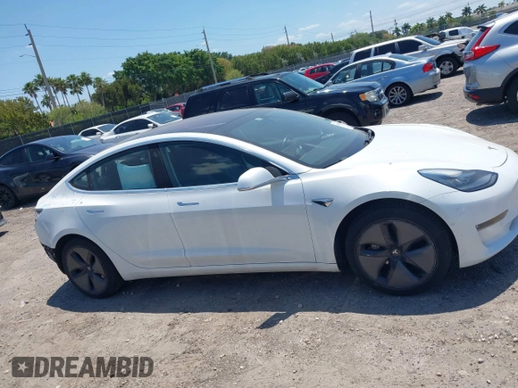 2018 Tesla Model 3 Long Range Battery with VIN 5YJ3E1EAXJF027179, listed as a IAAI auction lot 42059918 with 43,566 mi miles. Bid and sale history available at carsss.com. Image 14.