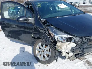 2015 Toyota Yaris L with VIN VNKJTUD34FA055116, listed as a IAAI auction lot 41601874 with 84,508 mi miles. Bid and sale history available at carsss.com. Image 6.