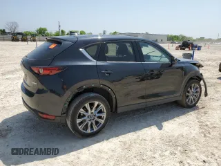 2021 Mazda CX-5 Grand Touring with VIN JM3KFADM5M0479247, listed as a Copart auction lot 51219915 with 33,384 mi miles and Salvage Title. Bid and sale history available at carsss.com. Image 3.