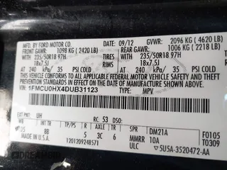 2013 Ford Escape SEL with VIN 1FMCU0HX4DUB31123, listed as a IAAI auction lot 41740392 with 171,239 mi miles. Bid and sale history available at carsss.com. Image 9.