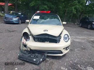 2019 Volkswagen Beetle S with VIN 3VWFD7AT2KM700941, listed as a IAAI auction lot 42474867 with 43,891 mi miles and . Bid and sale history available at DreamBid. Image 13.