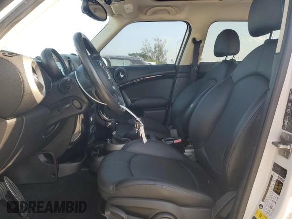 2012 MINI Countryman S with VIN WMWZC5C51CWL57074, listed as a Copart auction lot 53386715 with 55,857 mi miles and Salvage Title. Bid and sale history available at DreamBid. Image 7.