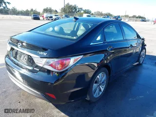2013 Hyundai Sonata Hybrid Limited with VIN KMHEC4A40DA090333, listed as a IAAI auction lot 41479624 with 164,745 mi miles. Bid and sale history available at carsss.com. Image 4.