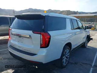 2023 GMC Yukon XL Denali with VIN 1GKS2JKT0PR478011, listed as a IAAI auction lot 41596312 with 21,286 mi miles. Bid and sale history available at carsss.com. Image 4.