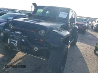 2017 Jeep Wrangler Unlimited Sport with VIN 1C4BJWDG8HL567051, listed as a IAAI auction lot 42495250 with 19,522 mi miles and . Bid and sale history available at DreamBid. Image 2.