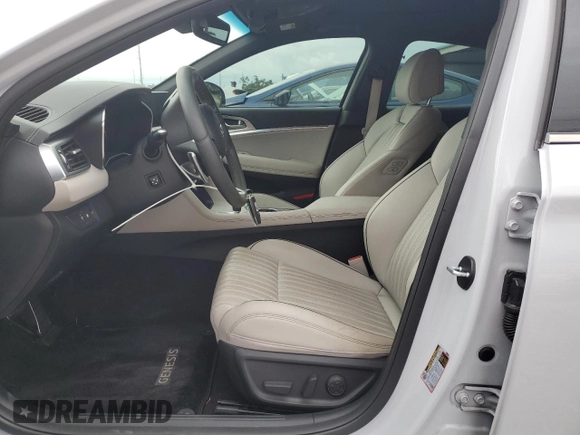 2023 Genesis G70 2.0T with VIN KMTG34TA3PU114905, listed as a Copart auction lot 61777435 with 26,493 mi miles and Salvage title. Bid and sale history available at DreamBid. Image 7.